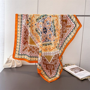 Vintage silk-feel square scarf with bohemian print in orange and cream tones