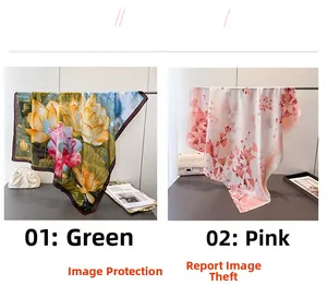 Detail of silk-like square scarves in green and pink lotus floral patterns