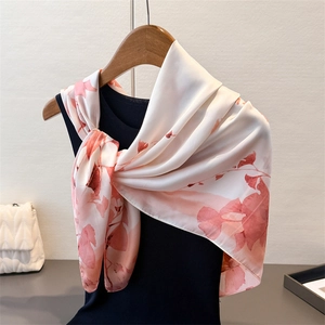 Ink style lotus floral silk scarf wrapped on a mannequin with a premium white leather handbag