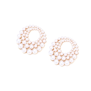 French style gold round earrings with layered faux pearls on white background