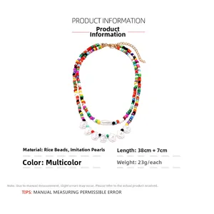 Detail of bohemian double-layer necklace with multi-color beads and faux pearls