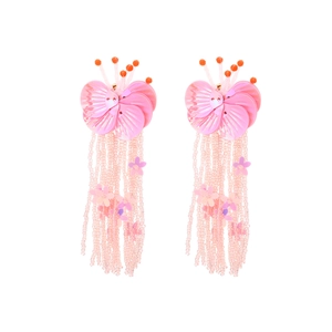 Bohemian pink beaded tassel earrings with sequin flower petal designs in a long drop style