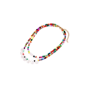 Double-layered bohemian necklace with multi-colored seed beads and irregular pearls