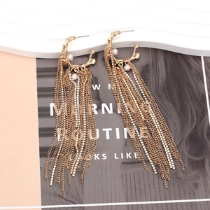 Long gold tassel earrings with C-shaped metal branch design, pearls and rhinestones