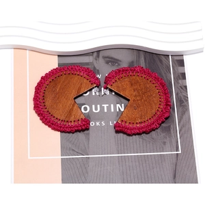 Bohemian geometric wooden crescent earrings with vibrant pink hand-woven crochet fringe