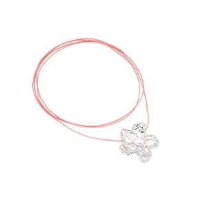 Pink cord necklace featuring a metallic flower pendant with a central pink pearl accent