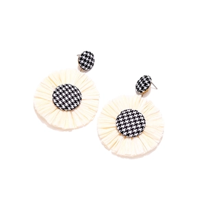 Bohemian houndstooth earrings with cream woven raffia fringe tassels in a circular design