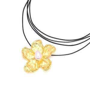 Pink wax cord necklace with a golden metallic flower pendant and a teardrop pearl
