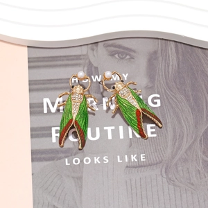 Charming enamel cicada drop earrings with crystal pavé wings and pearl accents