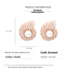 Detail showing dimensions of conch shell earrings with faux pearls and pink enamel