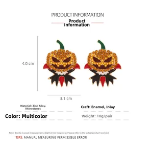 Detailed view of Halloween pumpkin earrings showing dimensions of 4.0cm height and 3.1cm width