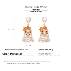 Détails des boucles d'oreilles fantôme avec perles et dimensions de 6,7 cm sur 3,2 cm