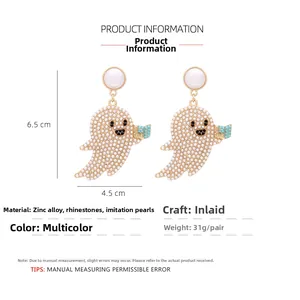 Détails des boucles d'oreilles fantômes avec perles et breloque livre BOO