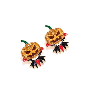 Halloween pumpkin earrings with colorful crystals and vampire cape design in alloy