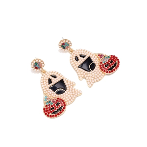 Halloween ghost earrings with white pearls and a red rhinestone pumpkin charm detail