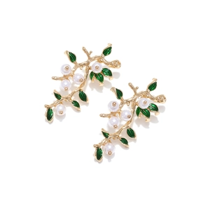 Retro vintage style branch earrings with green enamel leaves and white pearls