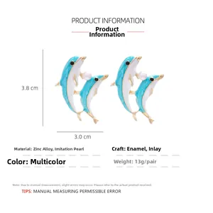 Detail view of enamel dolphin earrings with dimensions 3.8x3.0cm and weight 13g per pair