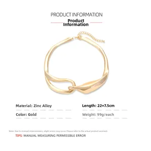 Detail of chunky gold metal choker showing organic irregular interlocking link design