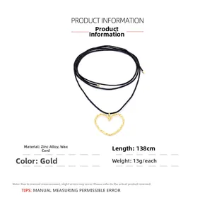 Golden hollow heart pendant on 138cm long black wax cord necklace with sizing specs