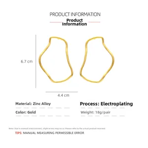 Detail of irregular geometric gold earrings with dimensions showing 6.7cm height and 4.4cm width