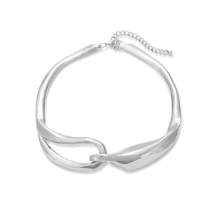 Asymmetric silver choker necklace with minimalist abstract twisted metal design