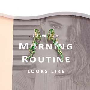Cute green enamel frog and golden lotus leaf dangle earrings for fashion women
