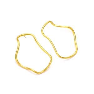 Minimalist irregular geometric gold hoop earrings with matte finish on white background