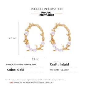 Detailed spec view of vintage oval gold leaf earrings with pearls, 4.3x3.1cm size guide