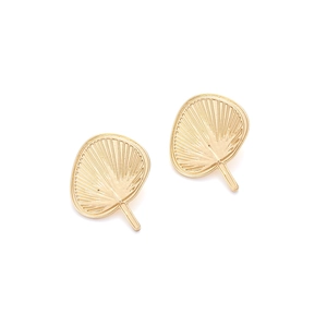 Detailed view of golden fan-shaped alloy studs with retro textures and radial lines
