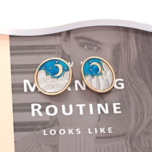 Retro round alloy star and moon enamel earrings with golden frame and blue night sky