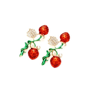 Cute strawberry earrings with red enamel fruits and sparkling rhinestones on gold alloy