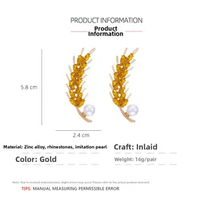 Golden wheat leaf earrings with yellow rhinestones and pearls detailing 5.8cm size