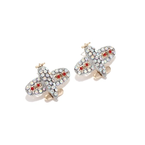 Boucles d'oreilles avion chic avec strass colorés sur une base plaquée or