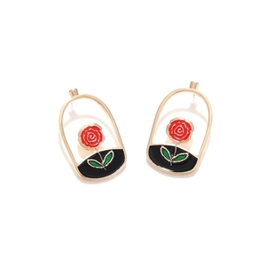 Vintage enamel rose earrings in gold U-shaped frame with red petals and green leaves