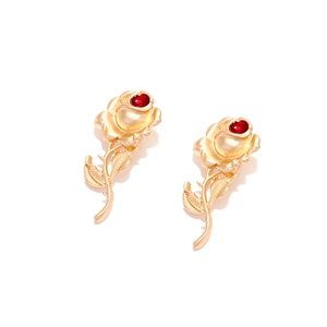 Vintage baroque matte gold rose drop earrings with red heart crystal center detail