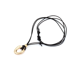 Minimalist gold irregular oval pendant on black adjustable cord necklace for women