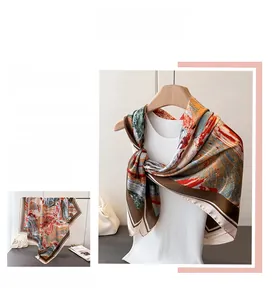 Close-up of abstract oil painting silk scarf with rich colors and elegant rolled edge