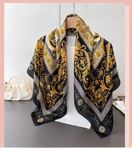 Detailed view of luxury faux silk scarf with baroque patterns and Greek key borders