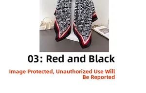 Detailed view of red and black satin scarf featuring a modern Greek Key geometric pattern