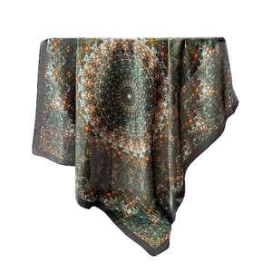 Mandala print satin square scarf in green and orange silk-like fabric with black border