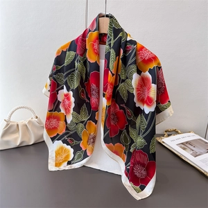 Elegant large floral silk-feel scarf with vibrant botanical print on a black background