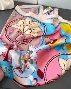 Detail of silk scarf showing intricate Dunhuang mural patterns and vibrant colors