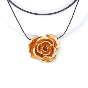 Elegant 3D golden rose pendant necklace with a minimalist black cord strap for women
