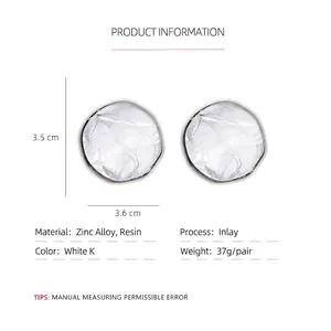 Irregular geometric round earrings in silver finish with white resin inlay for women