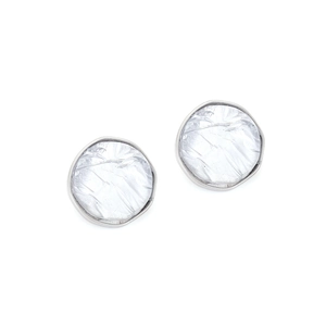 Macro view of silver geometric resin studs with unique foil texture and metallic frame