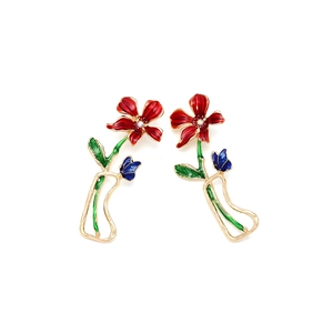 Boucles d'oreilles fleur et papillon avec émail rouge et strass brillants sur métal