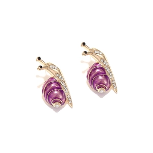 Detailed view of snail earrings with purple enamel, gold plating, and white rhinestones