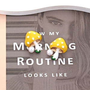Cute yellow enamel mushroom earrings with white pearls and green base accents