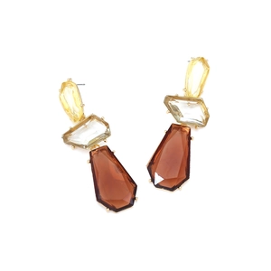 Three-tier geometric drop earrings in yellow, clear, and amber resin on gold metal