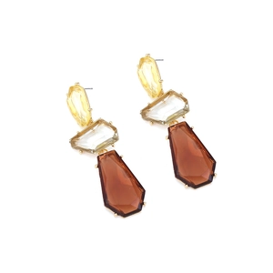 Detail view of colorful geometric resin earrings with amber and yellow transparent pieces